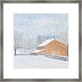 New Barn In Snowstorm Framed Print