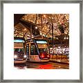 Night View Of Two Trams At Glories Station Framed Print