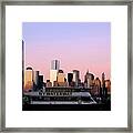 Nyc Skyline With Boat At Pier Framed Print