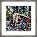 Old Ford Vintage Tractor In The Woods Framed Print