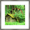Old Wheel And Cabin Framed Print