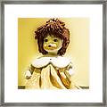 Porcelain Doll In Yellow Framed Print