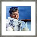 President John Kennedy Smoking A Cigar Framed Print