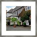 Quiet Street With Flowers On Walls. Framed Print
