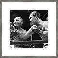 Rocky Marciano Landing A Punch Framed Print