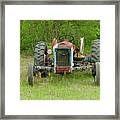 Rusty Tractor Framed Print