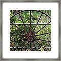 Rusty Wagon Wheel On Fence Framed Print