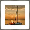 Sailboat And Sunrise Framed Print