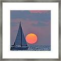 Sailboat At Sunset Framed Print