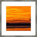 Sailboat In The Sunset Framed Print