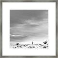 Sentinel Against A Winter Sky Framed Print