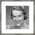 Smiling Woman Holding Tooth Brush Framed Print