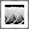 Snow On A Fence Framed Print