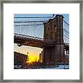 Snowy Sunset Under The Brooklyn Bridge Framed Print