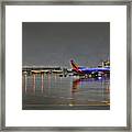 Southwest Plane In The Rain Framed Print