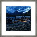 Stormy Skies Over Many Glacier Lodge Framed Print