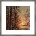 Sun Setting Over The Sea Framed Print