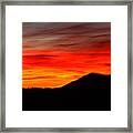 Sunrise Against Mountain Skyline Framed Print