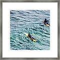 Surfers Framed Print