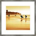 Surfers Silhouettes Framed Print