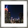The Empire State Building In Red White And Blue New York Ny Framed Print