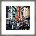 The Iconic Chicago Theater Sign And Traffic On State Street Framed Print