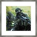 U.s. Navy Seals Cross Through A Stream Framed Print