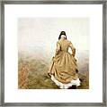 Victorian Woman Running On The Misty Moors Framed Print