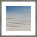 Wisps Of Clouds At Sunset Over A Calm Bay Framed Print
