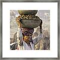 Woman Carrying Camel Dung Framed Print