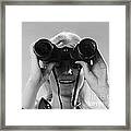 Woman Looking Through Binoculars Framed Print