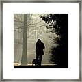 Woman Walking Dog Framed Print