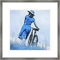 Woman With Bicycle In Field Framed Print