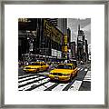 Yellow Cabs Cruisin On The Times Square Framed Print