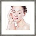 Young Woman Touching Her Skin. Framed Print