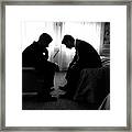 John Kennedy Confers With Robert Kennedy Framed Print