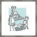 Mother Doing Laundry With Son #1 Framed Print