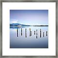 Wooden Pier Or Jetty Remains On A Blue Lake Sunset And Sky Refle #3 Framed Print