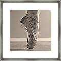 A Ballerinas Foot En Pointe Framed Print