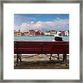 A Bench And A Hat Framed Print