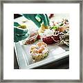 A Chef Arranging A Fish Dish On A White Porcelain Plate Framed Print