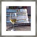 A Glass Of Chardonnay Sitting On A Framed Print