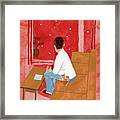 A Man Watching The City Of Snow From The Living Room Framed Print