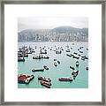 A View Of Hong Kong Harbor Through A Framed Print
