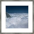 Airplane Tail  In A Sea Of Clouds Framed Print