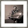 Boy In Aviator Suit Sitting In Toy Plane Framed Print