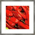 Bright Red Peppers In The Central Market Framed Print