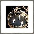 Candle Reflections Framed Print