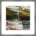 Caves In A Cliff Framed Print