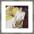 Clotilde Sitting On A Sofa Framed Print